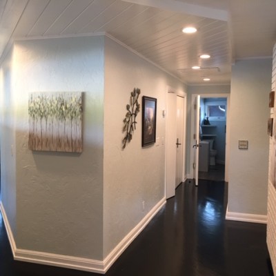 a stainless steel refrigerator in a room
