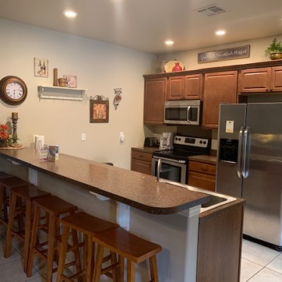 a modern kitchen with stainless steel appliances